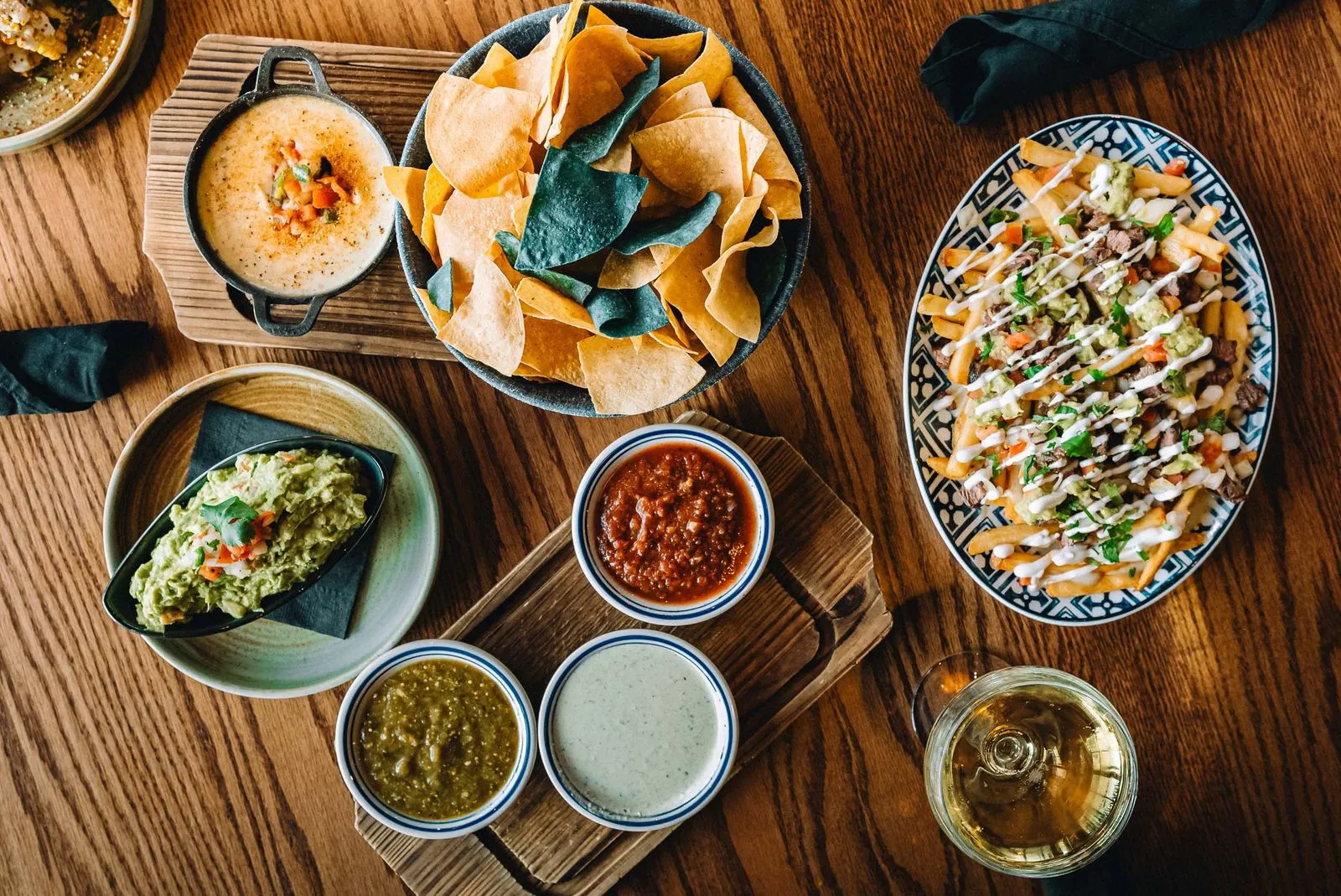 Top down shot of food and appetizers served at the rooftop bar at Azul Cantina in Pigeon Forge, Tennessee