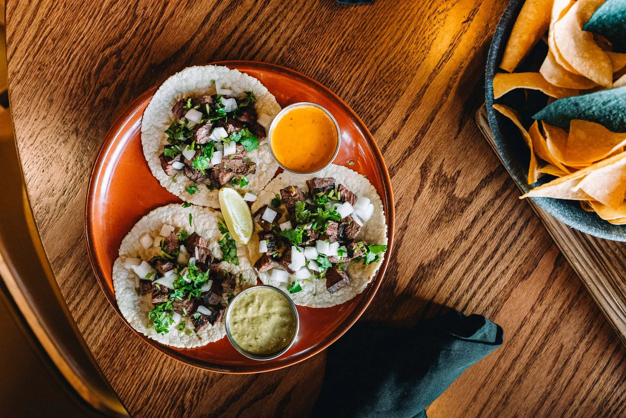 top down shot of specialty tacos served at the rooftop bar at Azul Cantina in Pigeon Forge, Tennessee
