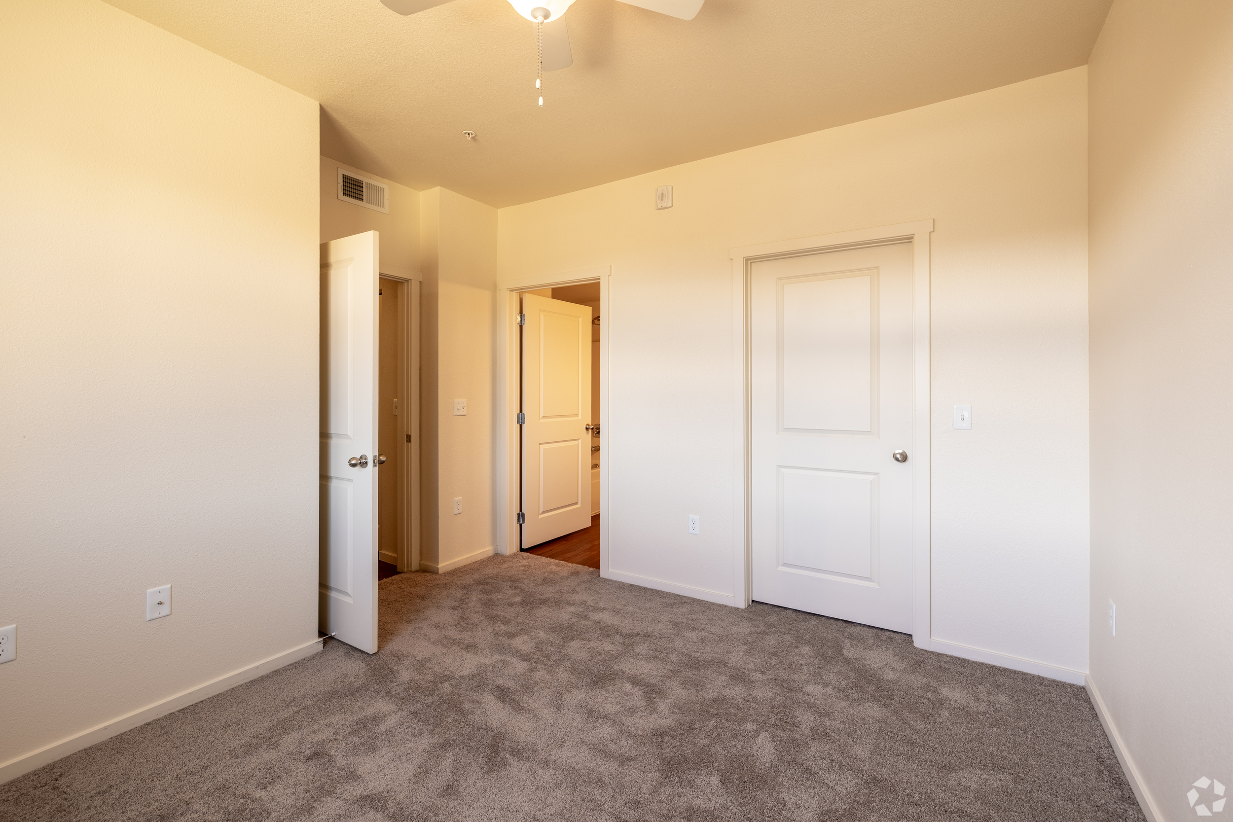 Unfurnished bedroom with a closet and carpet