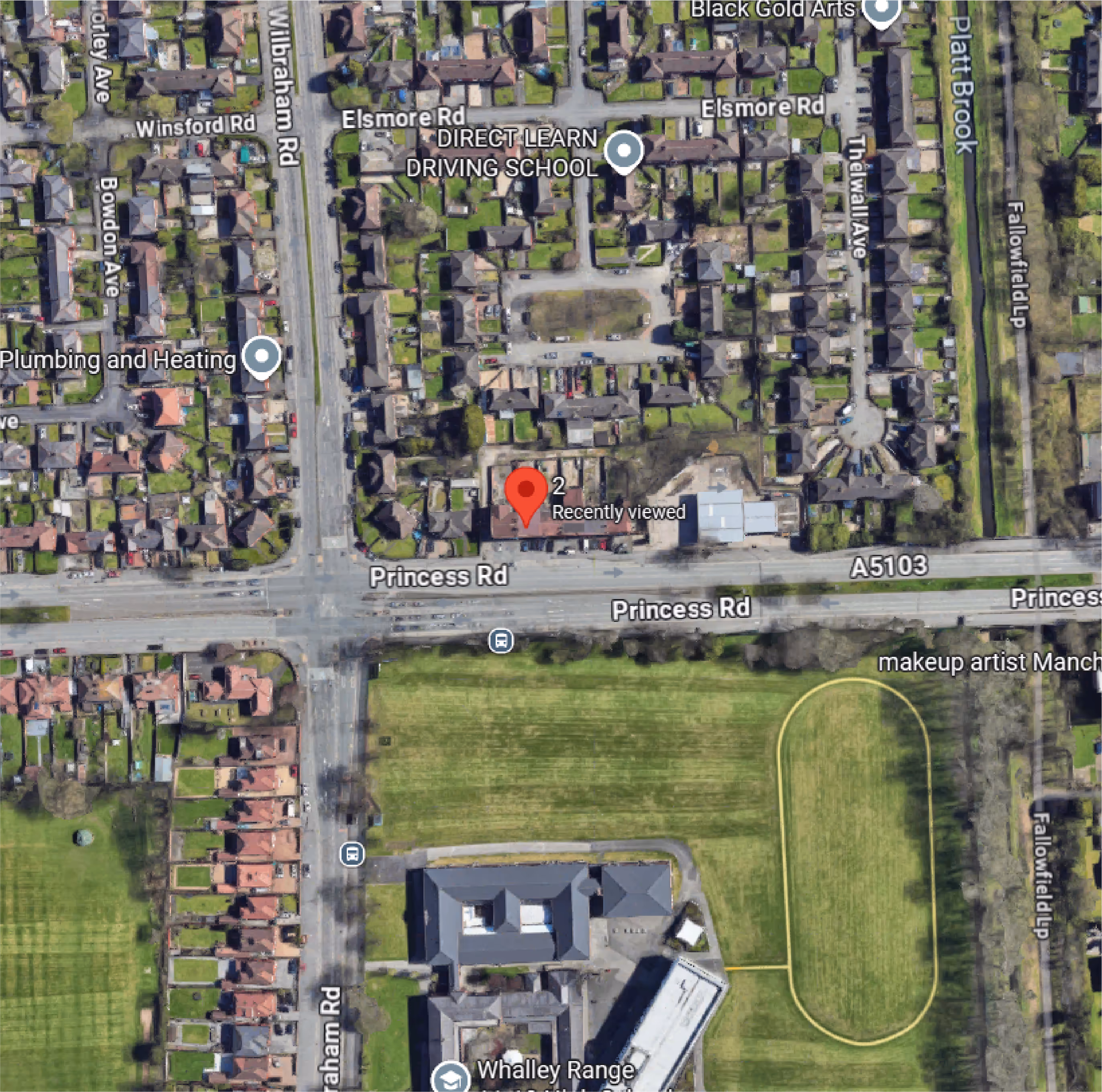 Aerial view of a residential neighborhood intersected by Princess Road with labeled streets and buildings.