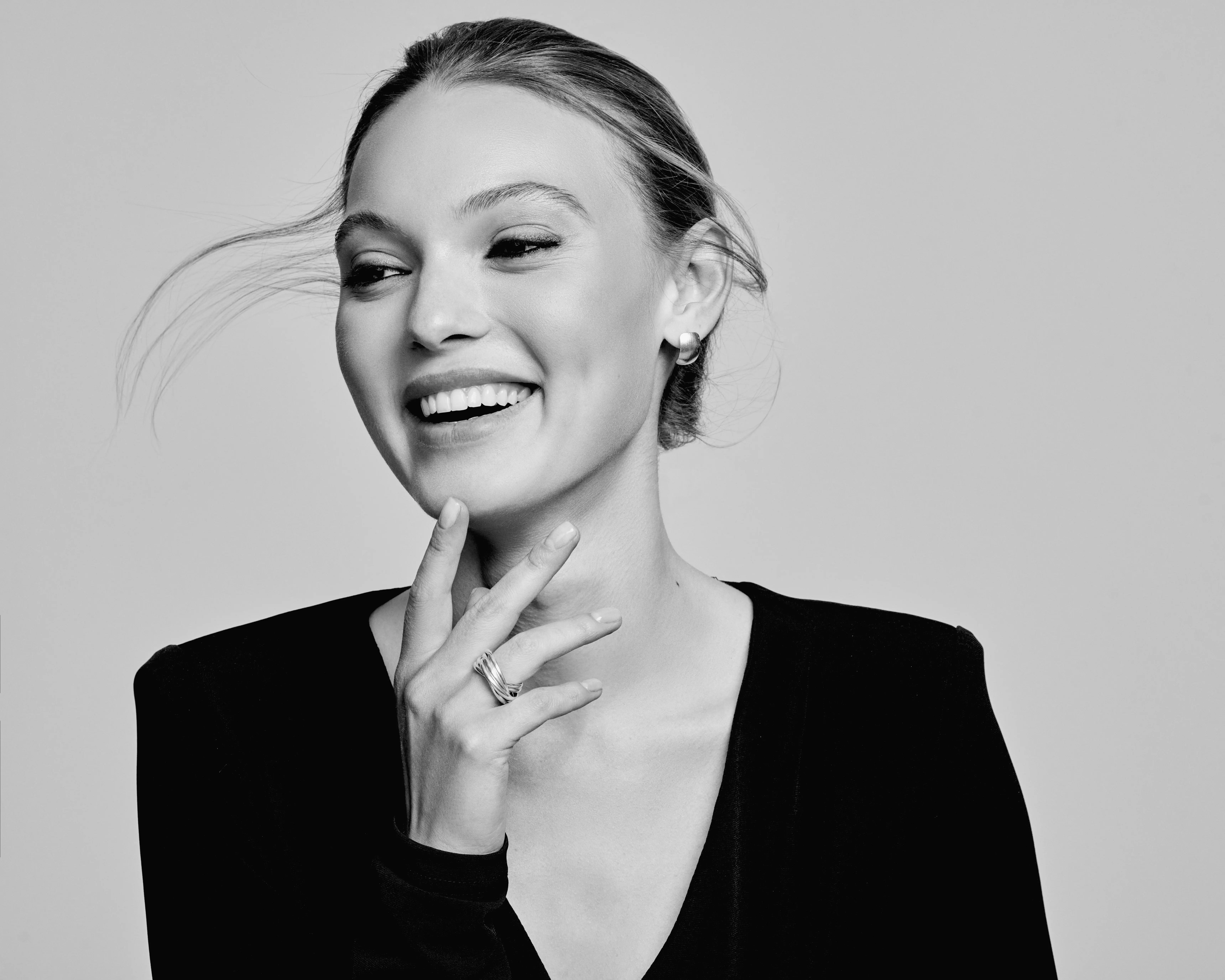 black and white photo of woman smiling