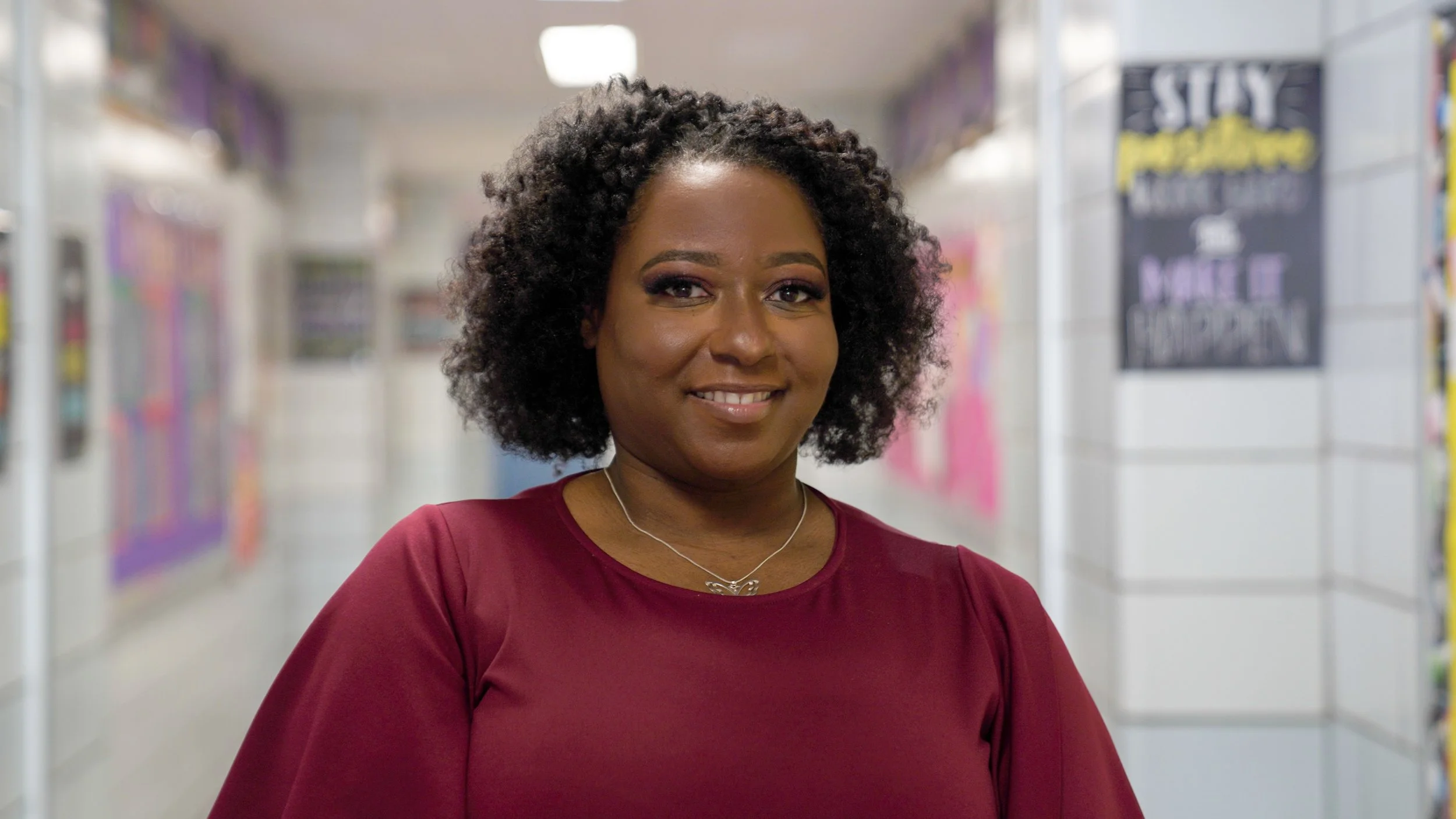 Smiling woman with long dark hair 