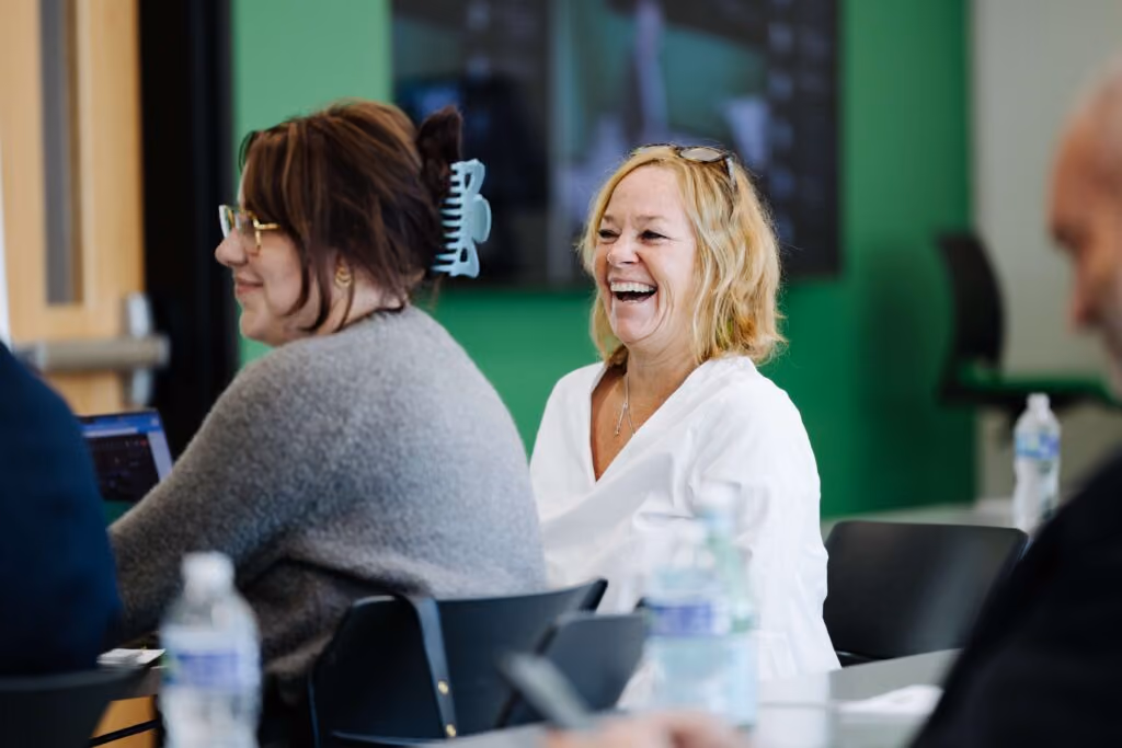 Mary Cook smiling during an AAM presentation.