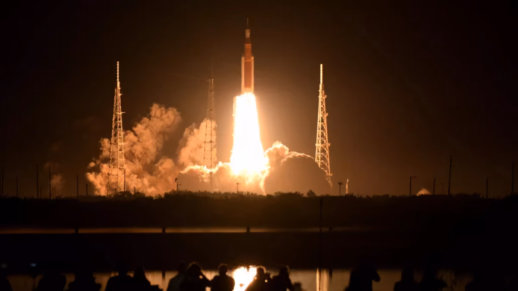 Artemis I launches on November 16th with spectators in the foreground.