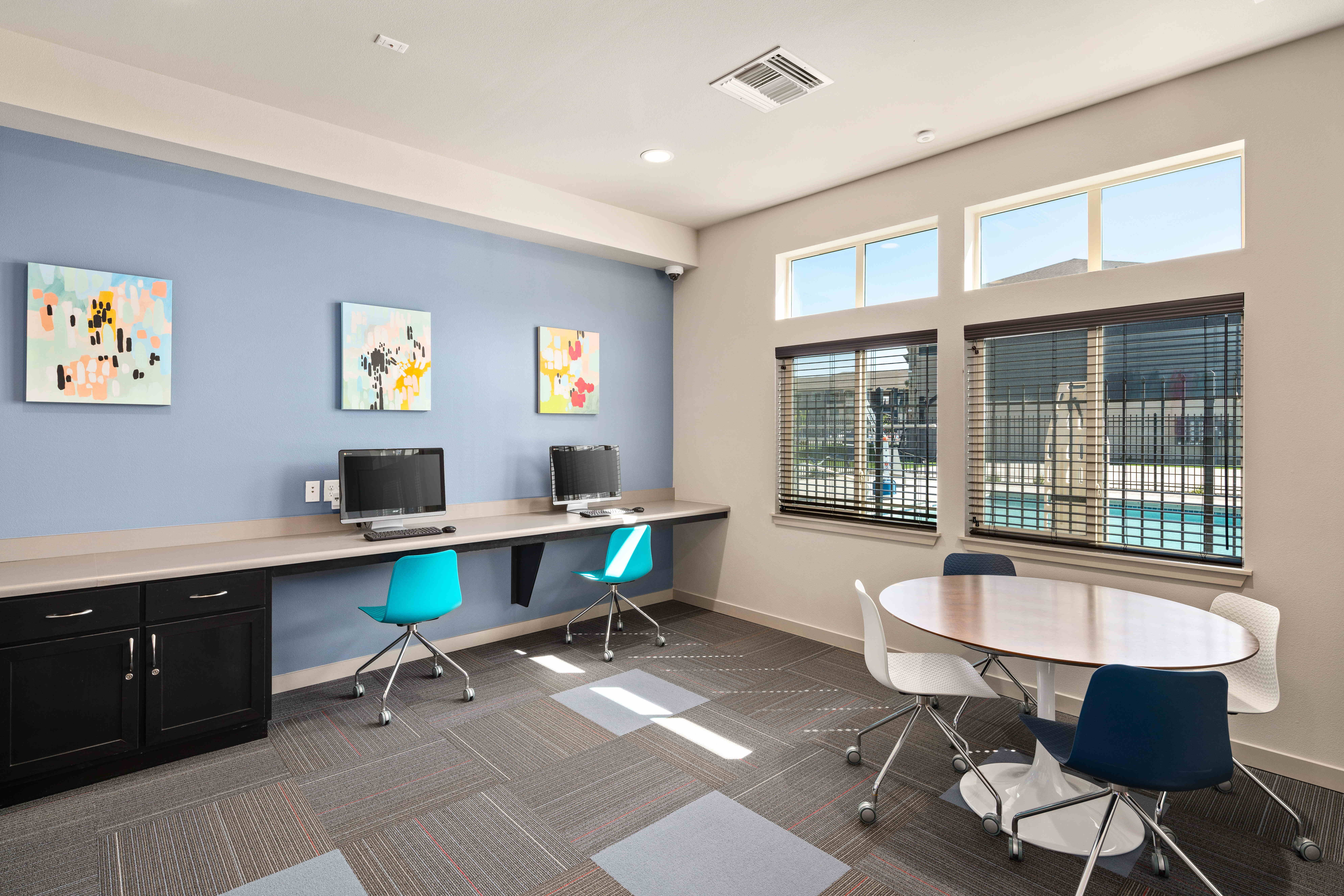 Business center with computers and desks
