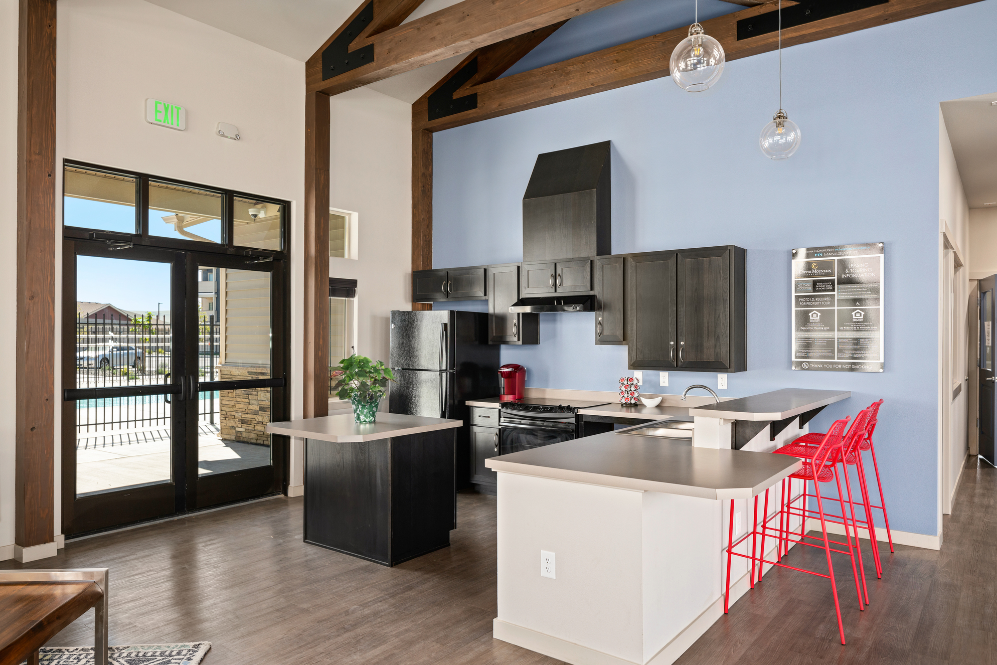 copper mountain clubhouse ktichen with black fridge and stove