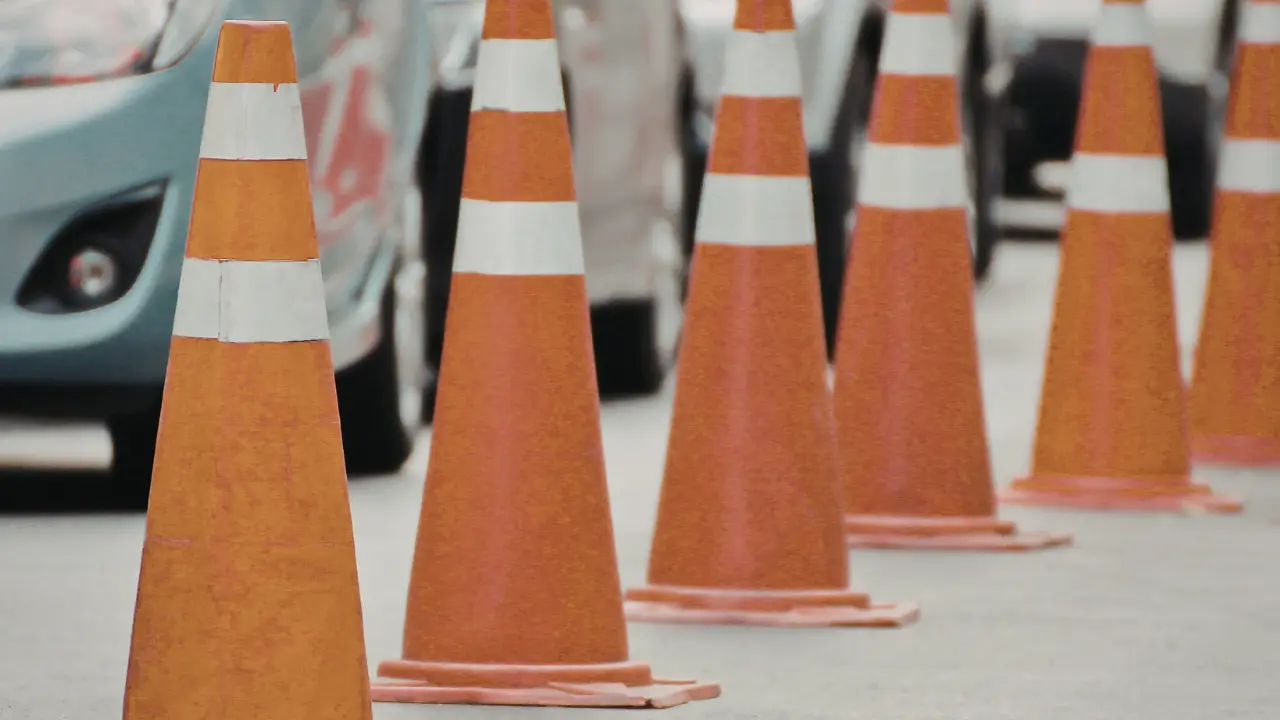 6 traffic cones in a line