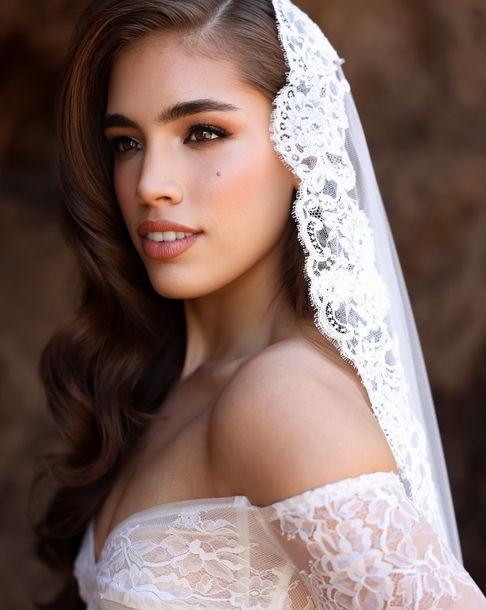 Professional makeup and hair styling by Nancy Olmos for bridal portrait with lace veil