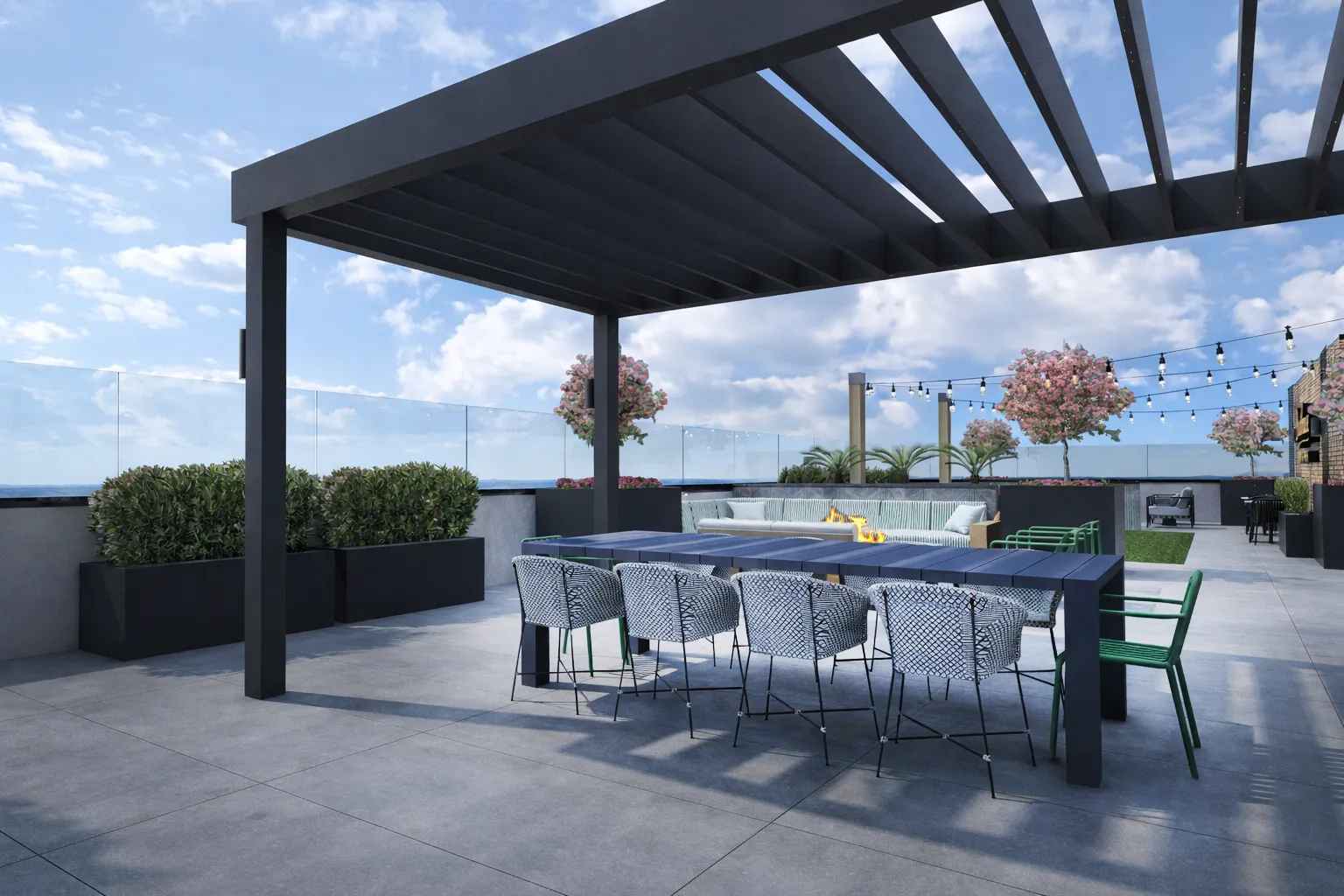 Modern rooftop patio with a dark pergola, a large table surrounded by chairs, a fire pit sofa area, string lights, and decorative plants.