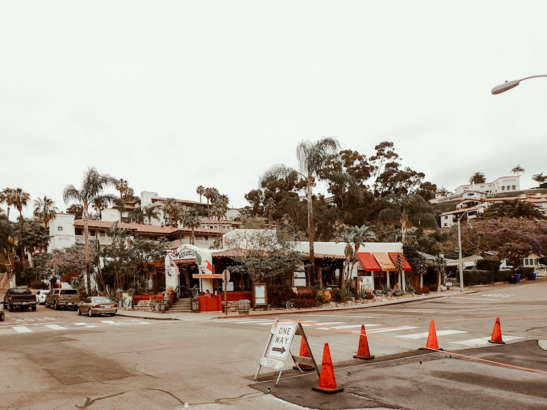 Sunny morning street scene in North Park San Diego neighborhood with cafe seating