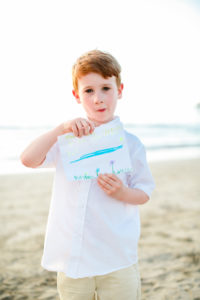 Boy on the beach in Kauai.