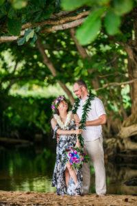 Couple on the beach in Hawaii, eloping.