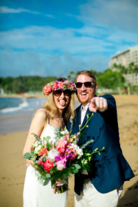 Married couple on the beach in Hawaii.