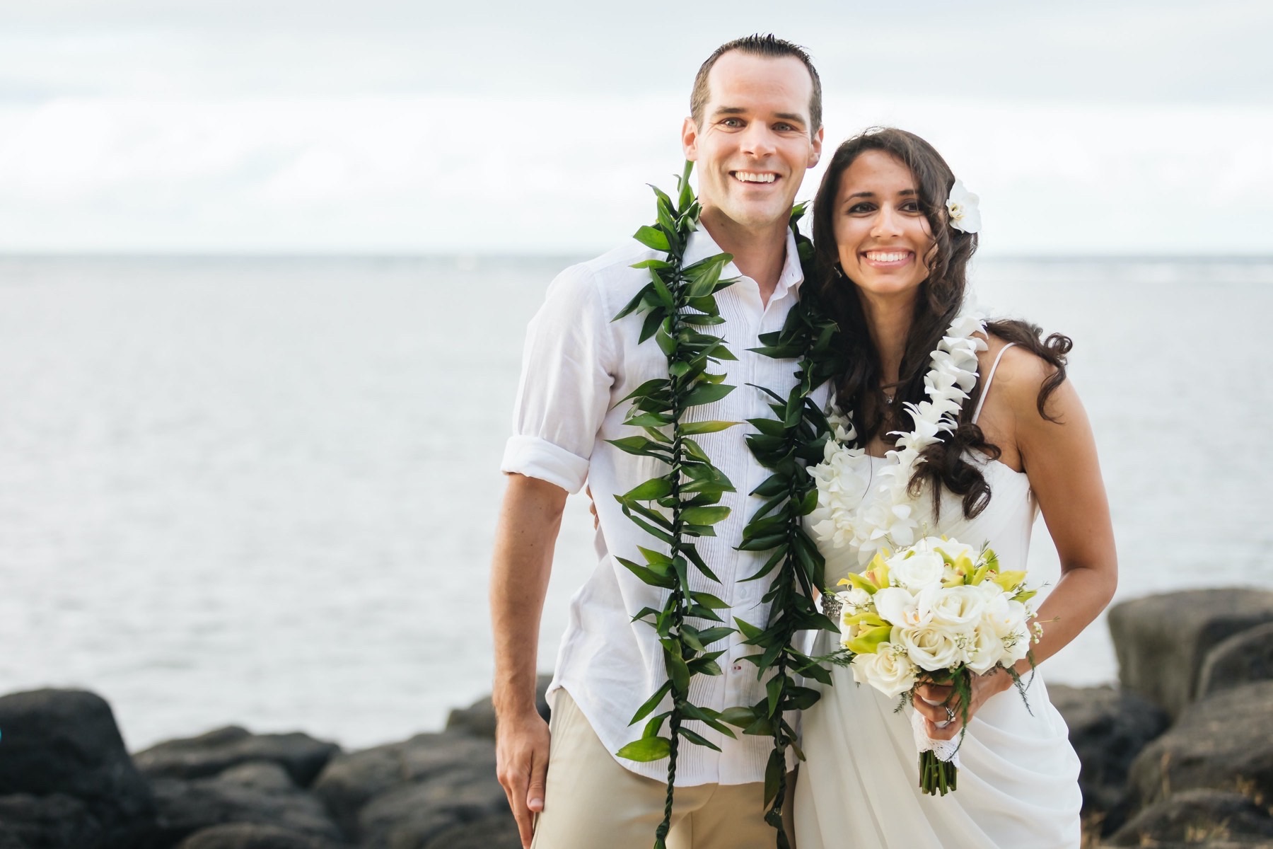 Husband and wife after wedding on the beach.