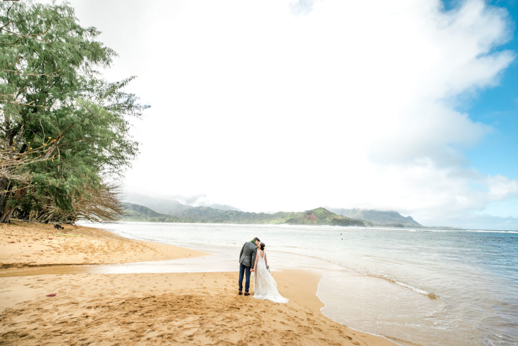 Bride and Groom on the beach in Kauai.