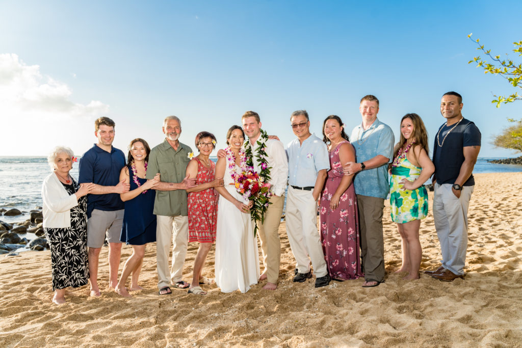 The couple's family on the beach in Kauai.