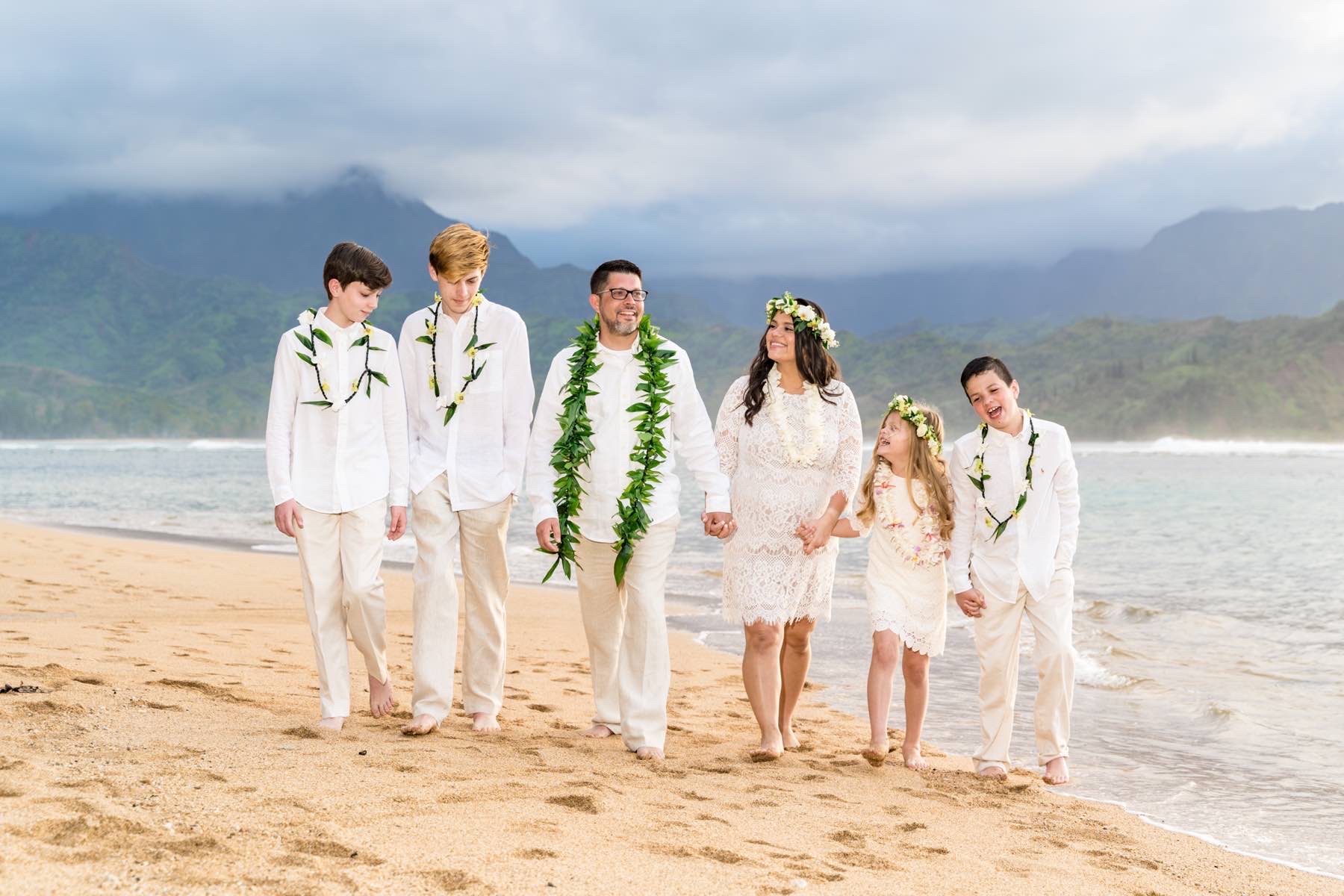 Family on the beach for a wedding in Hawaii.