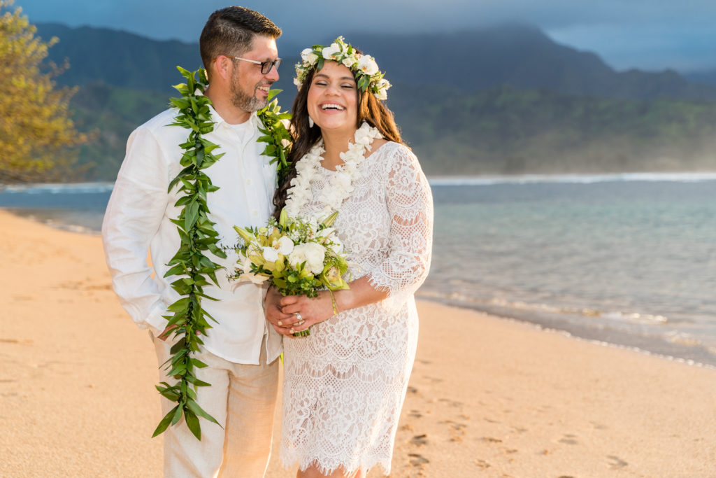 Bride and groom on the beach in Kauai.