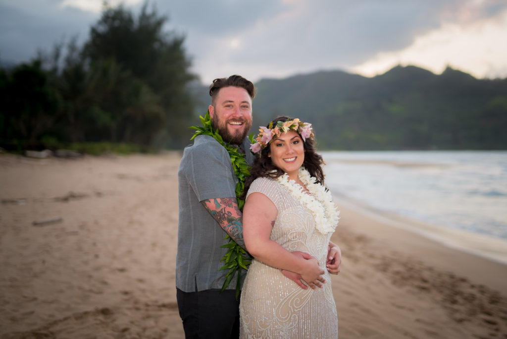 Bride and groom for their wedding on the beach.