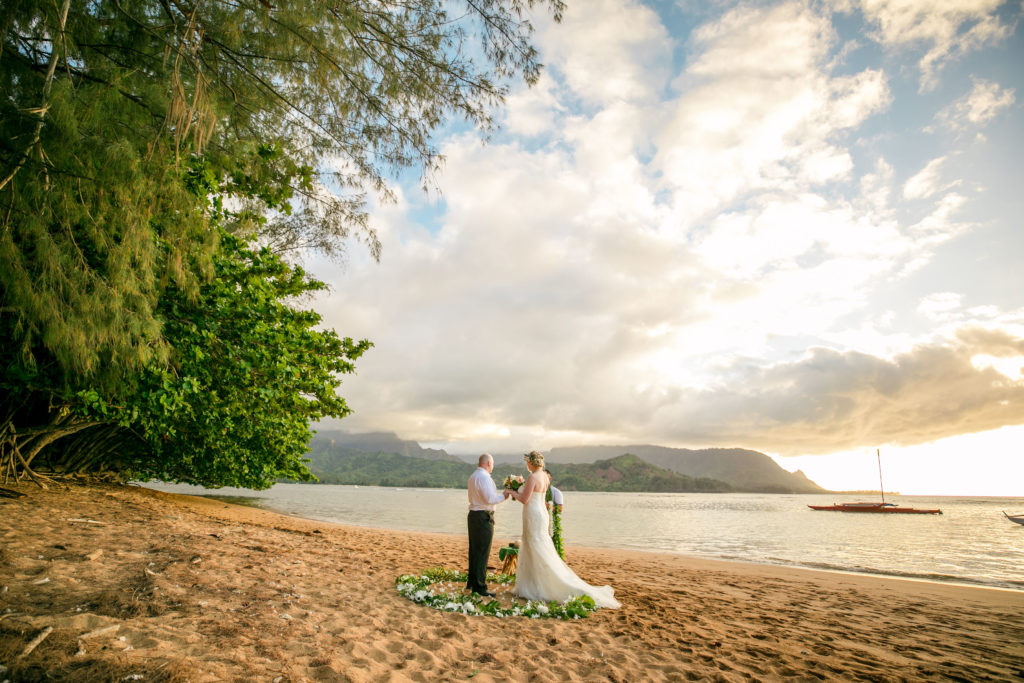 Bride and groom eloping on the beach.