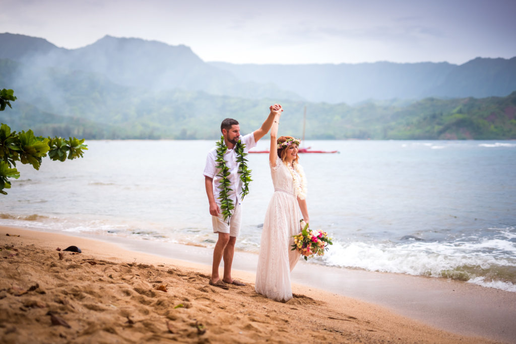 Bride and groom on the beach.