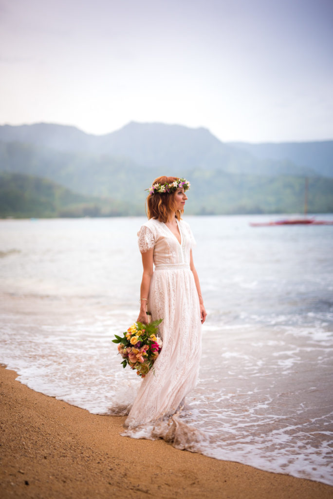Bride with flower bouquet.