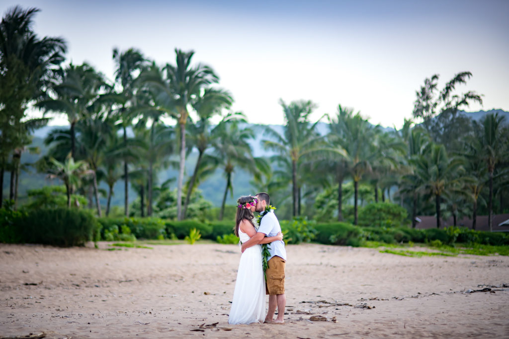 Bride and groom on the beach.