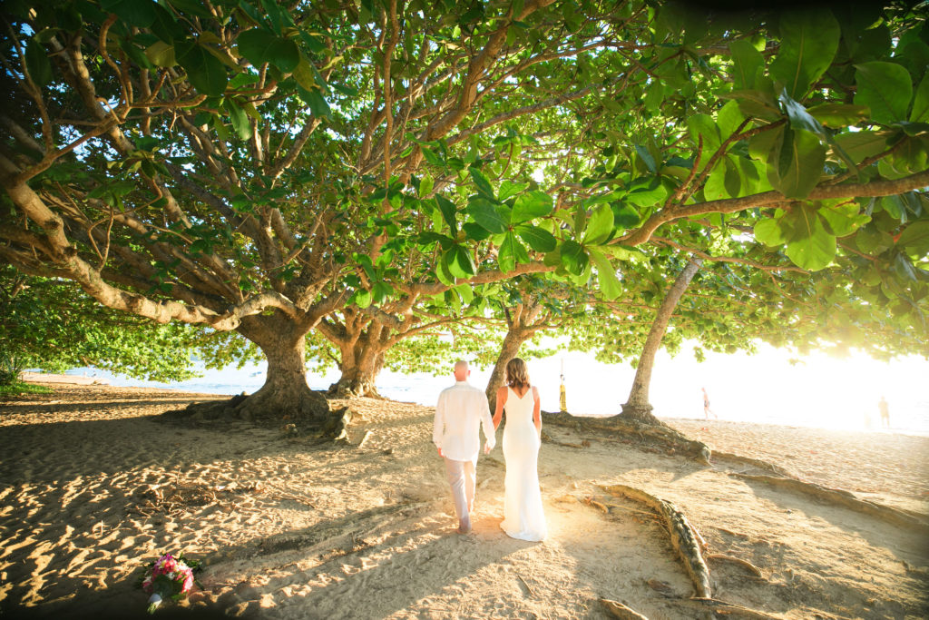 Bride and groom on the beach.
