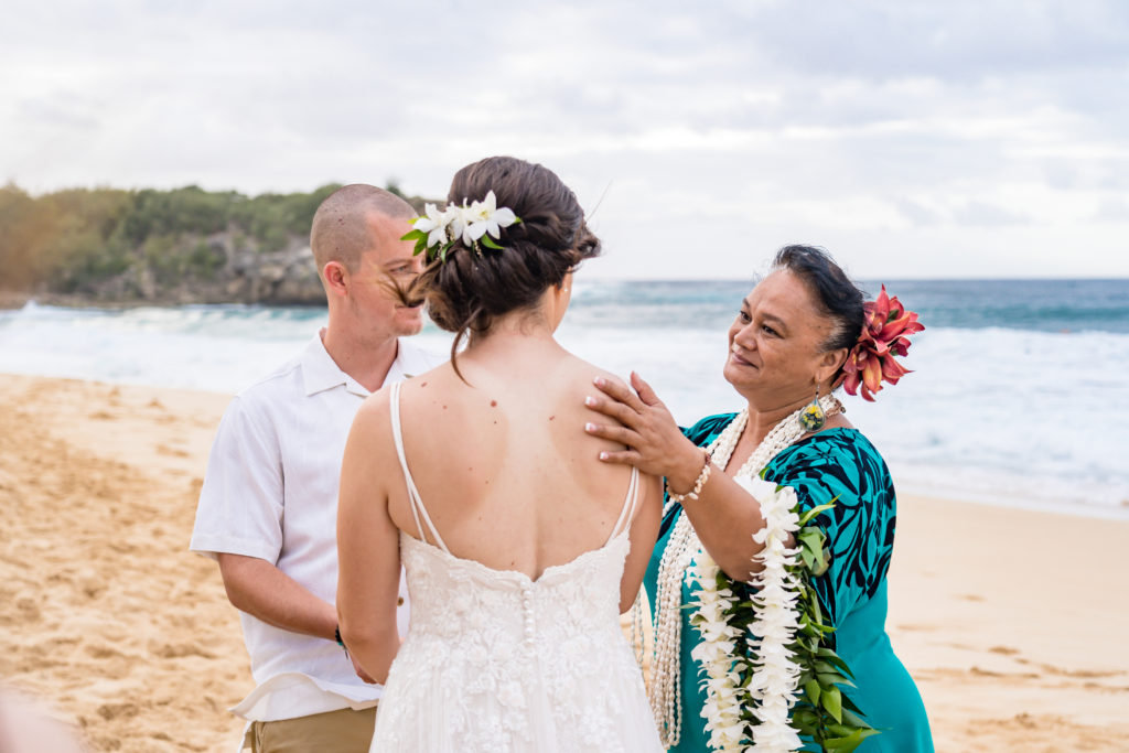 Getting married on the beach in Hawaii.