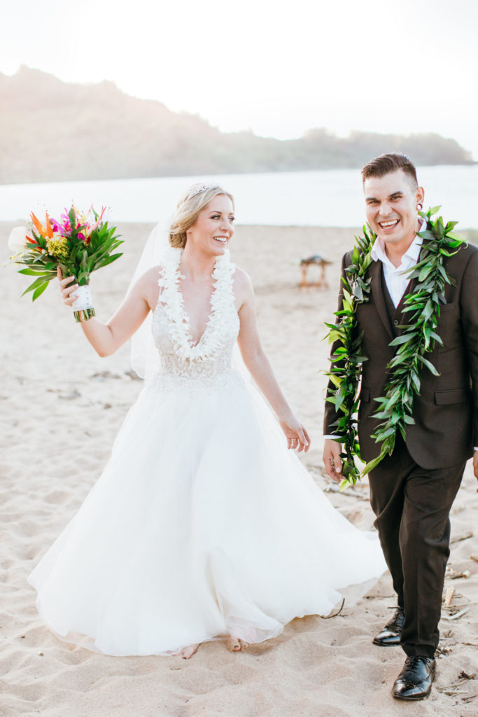 Bride and groom on the beach.
