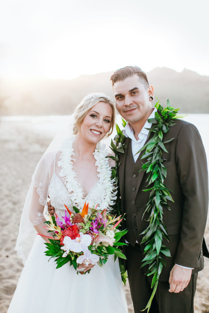 Bride and groom on the beach.