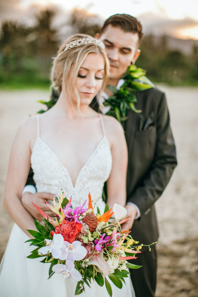 Bride and groom on the beach.