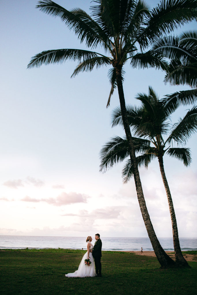 Bride and groom on the beach.