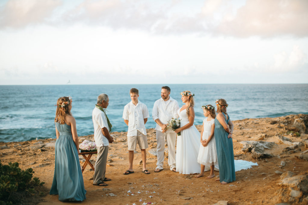 Gathered for wedding on the beach in Hawaii.