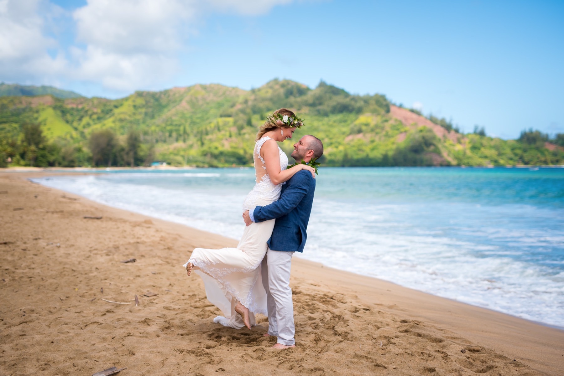 Bride and groom on the beach.