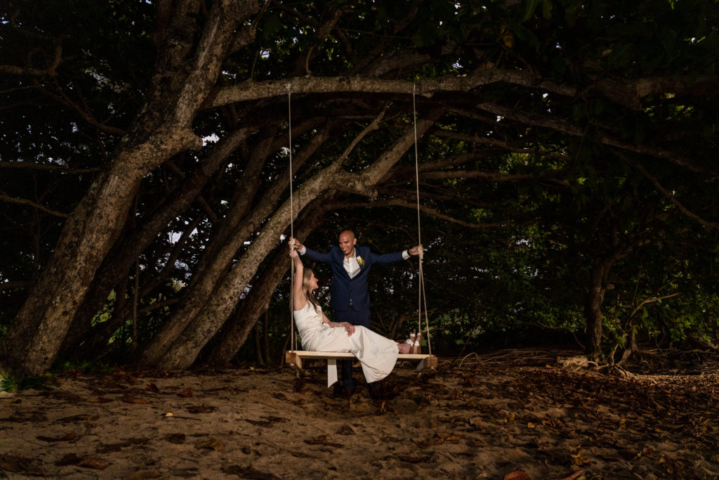Bride and groom on the beach.