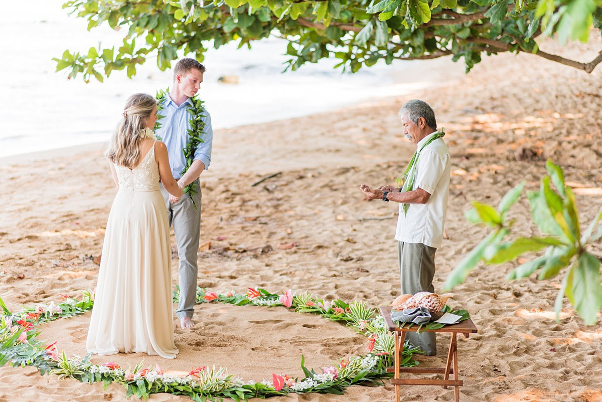Monte & Renee getting married on the beach in Hawaii.
