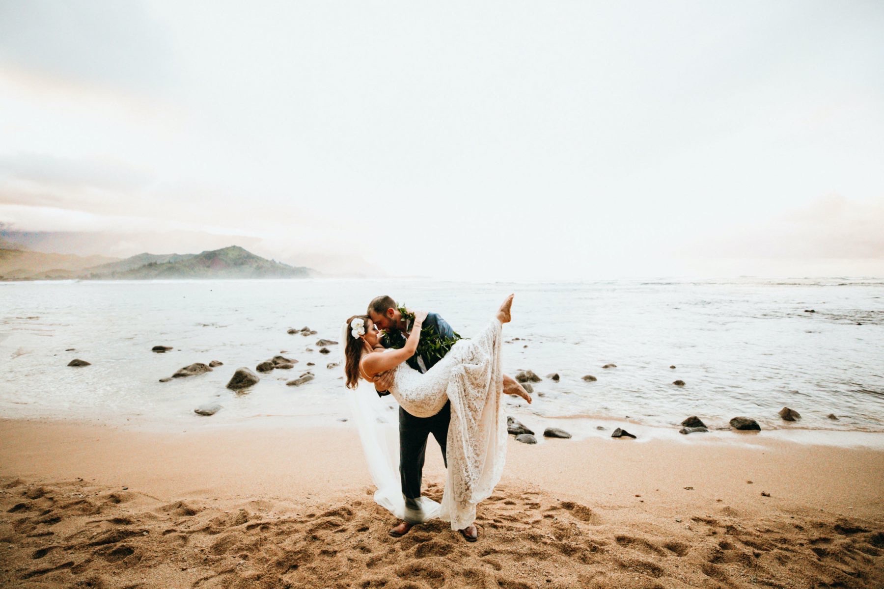 Adrianne & Ryan eloping on the beach in Hawaii.