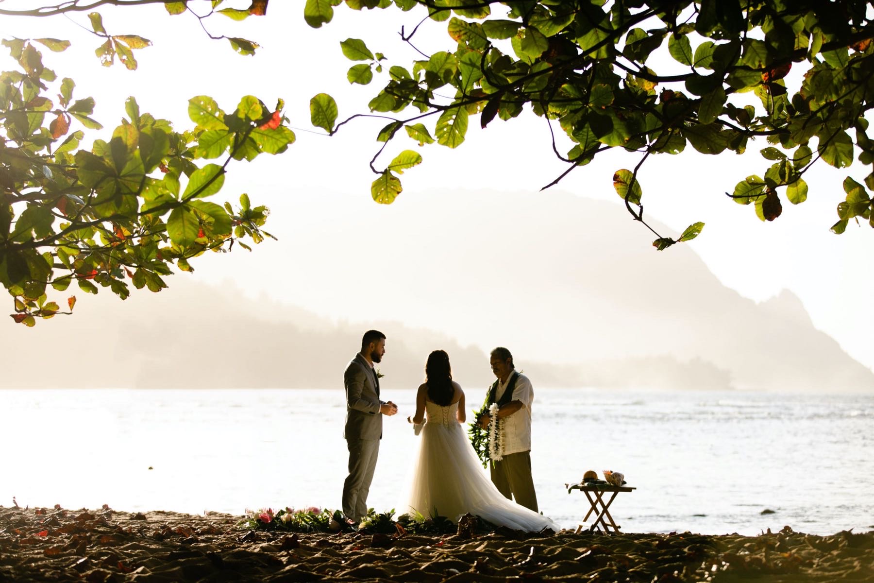 Paige & Jose getting married on the beach in Kauai.
