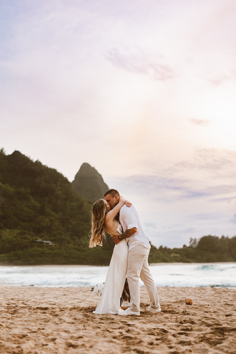 A sunset ceremony on Tunnels beach in May for Carly and Mike preformed by Kahu Ai 