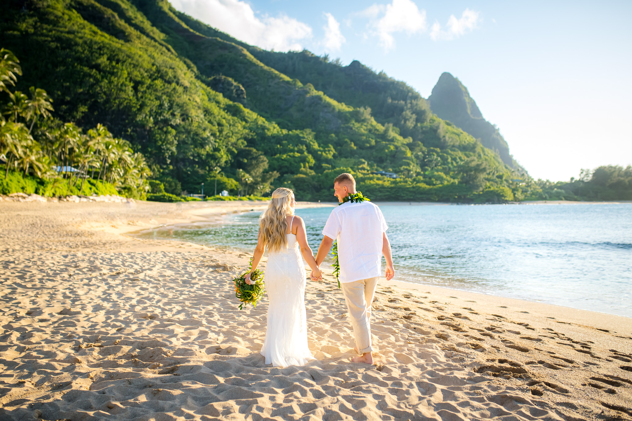 Private sunset ceremony at Tunnels beach in June for Amelia and Gary. 
