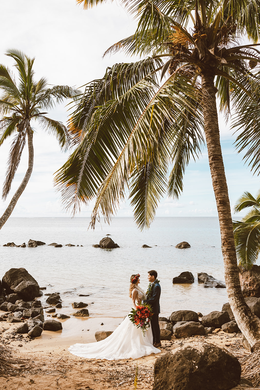 Couple in the tide pools on Anini.