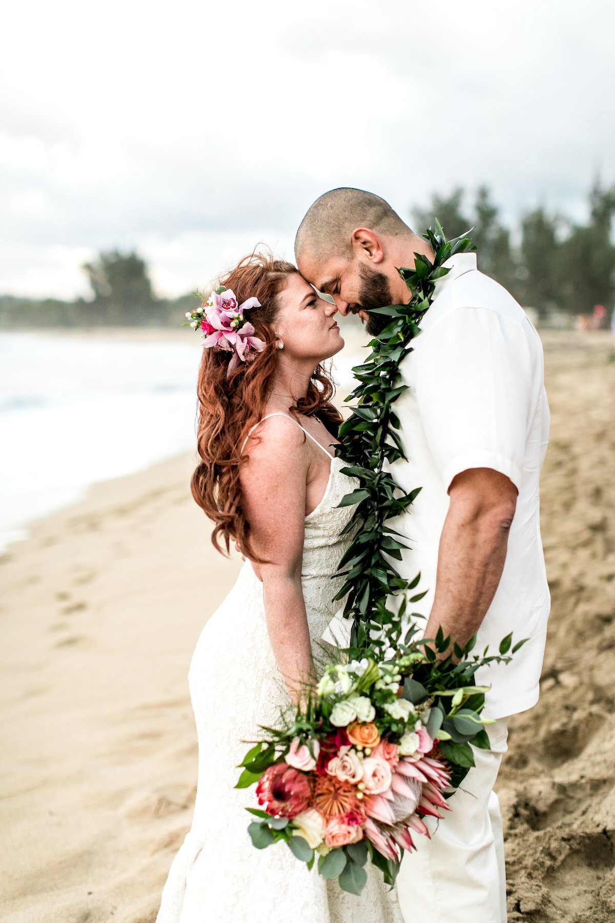 Hannah and Ramon on a beach in kauai