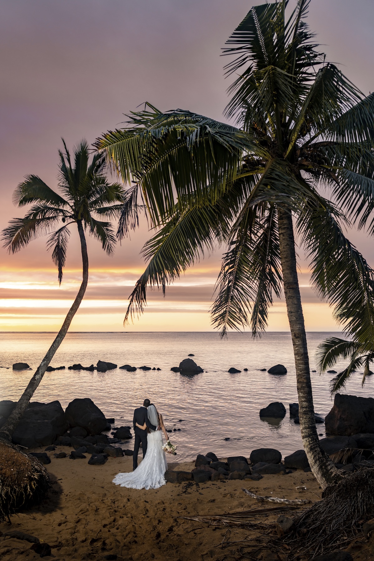 Couple in the tide pools on Anini.