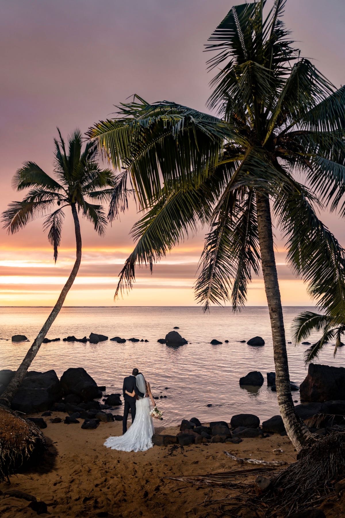 Couple in the tide pools on Anini.