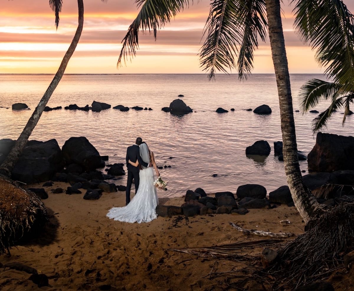 Couple in the tide pools on Anini.