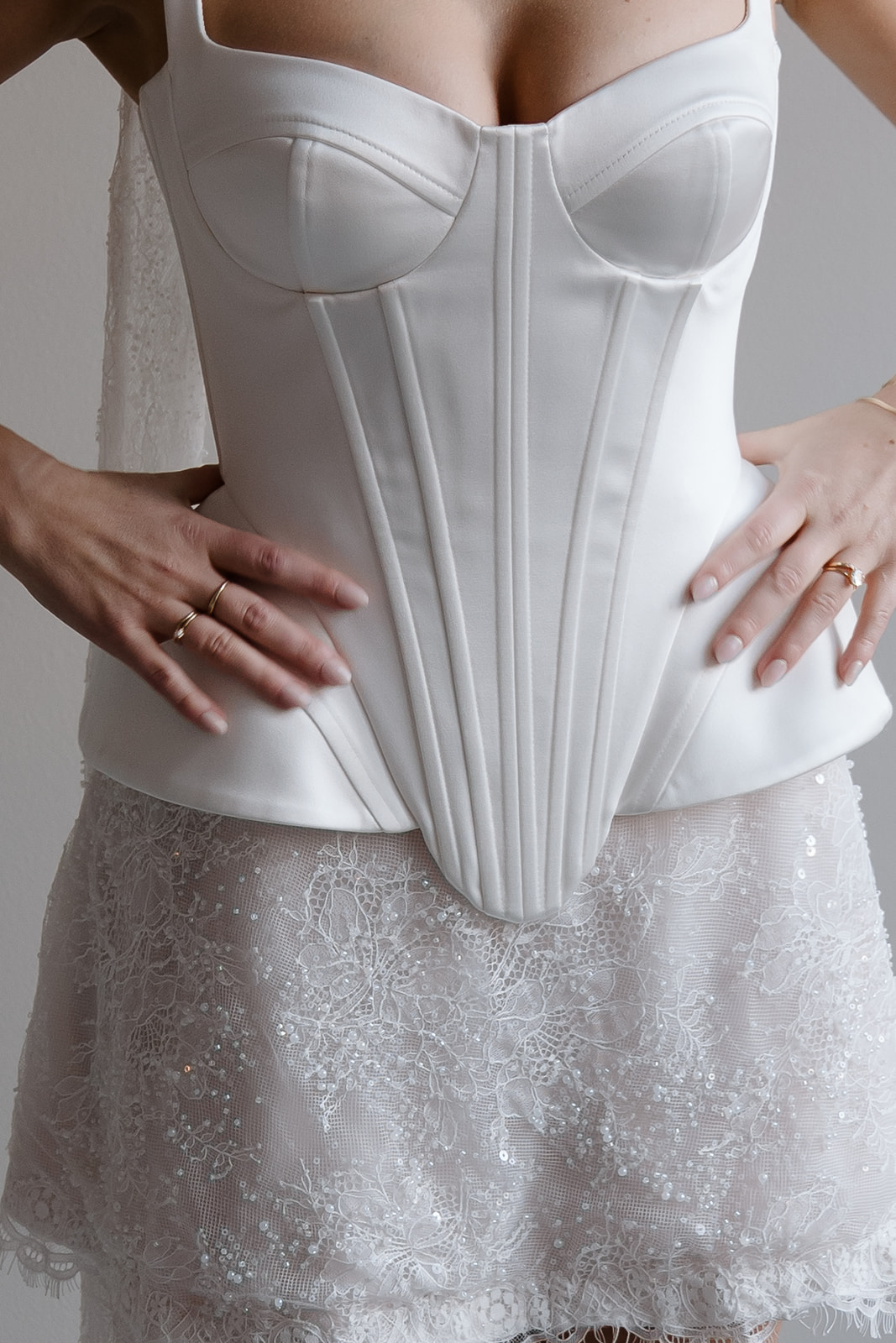 image of a customer being fitted with sewing pins
