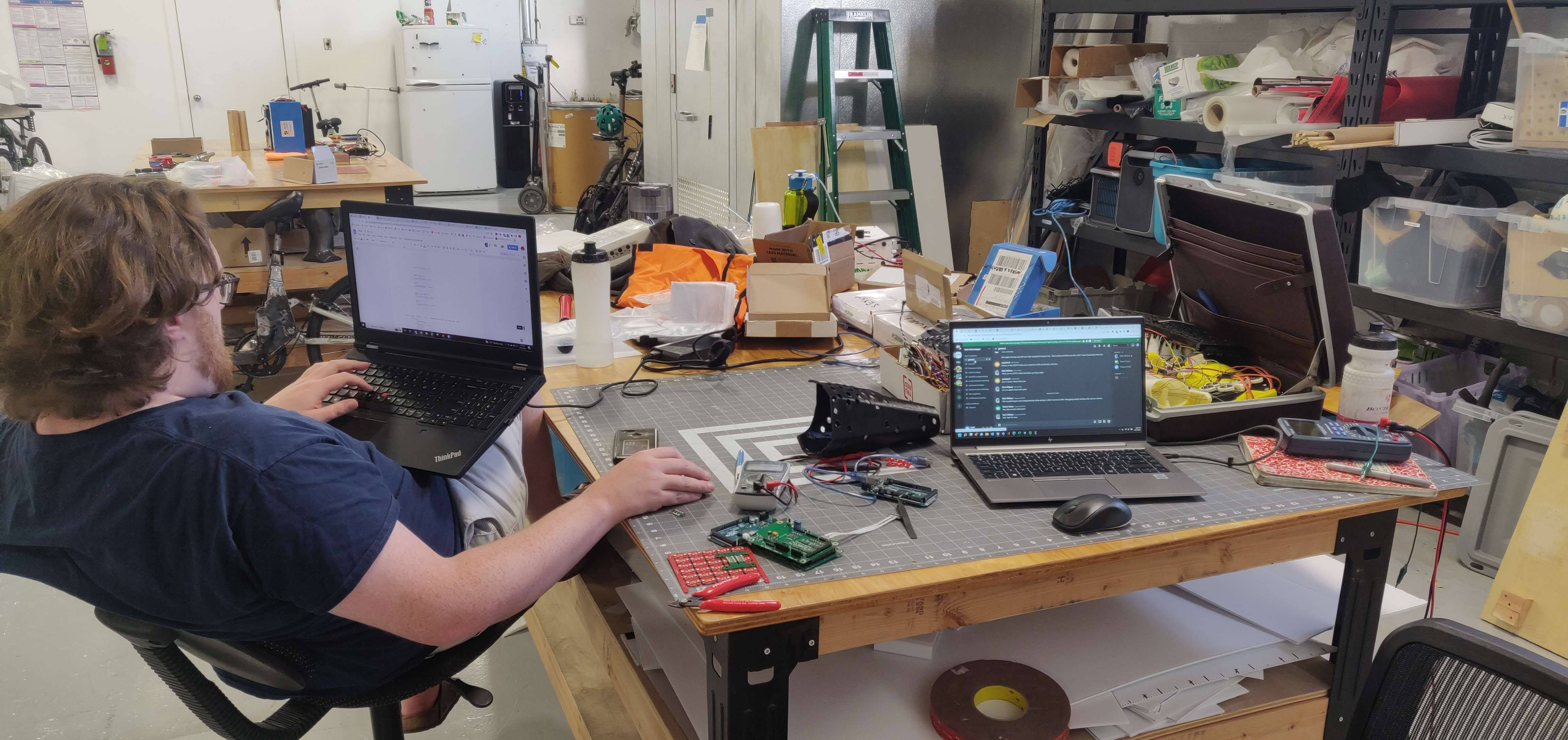 Hardware and instrumentation on a working bench, mid-build.