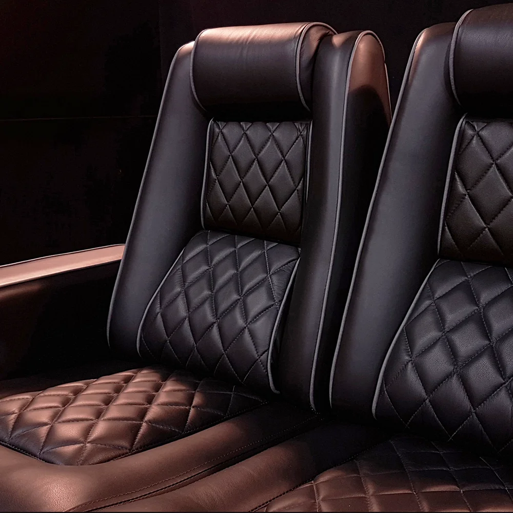 Home theater seating models featuring quilted leather upholstery and contoured backrests by Elite HTS