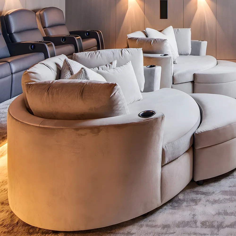 Curved cuddle couch seating used in a luxury home theater front row by Elite HTS